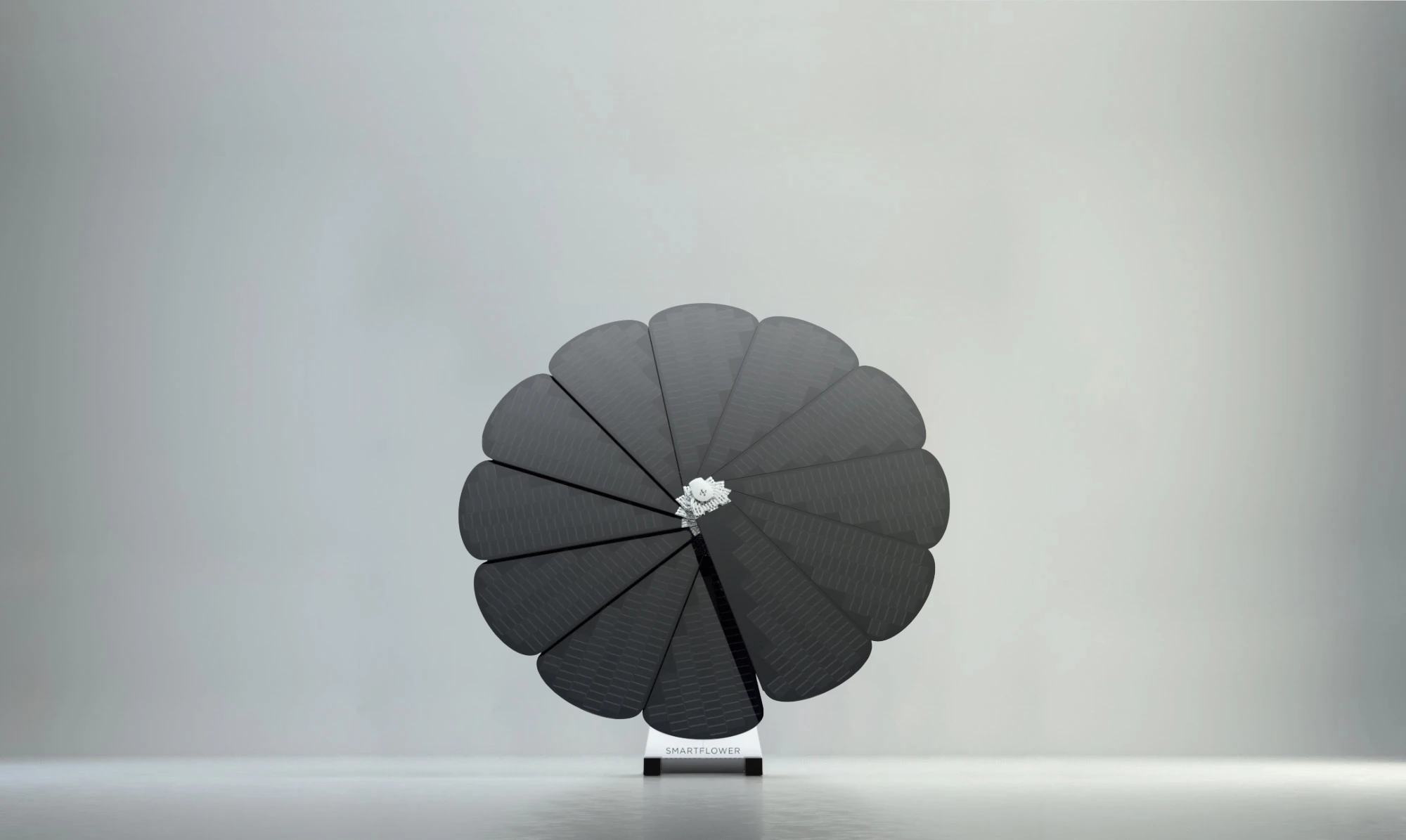 Single SmartFlower Stands Against a Grey Background in an Open Studio