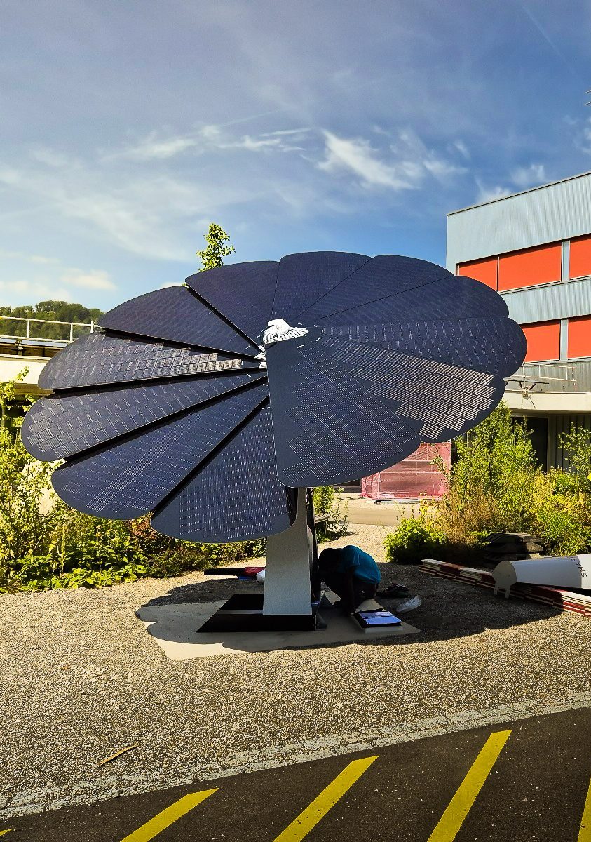 Innovative solar panel generating energy in front of metal-clad industrial structure