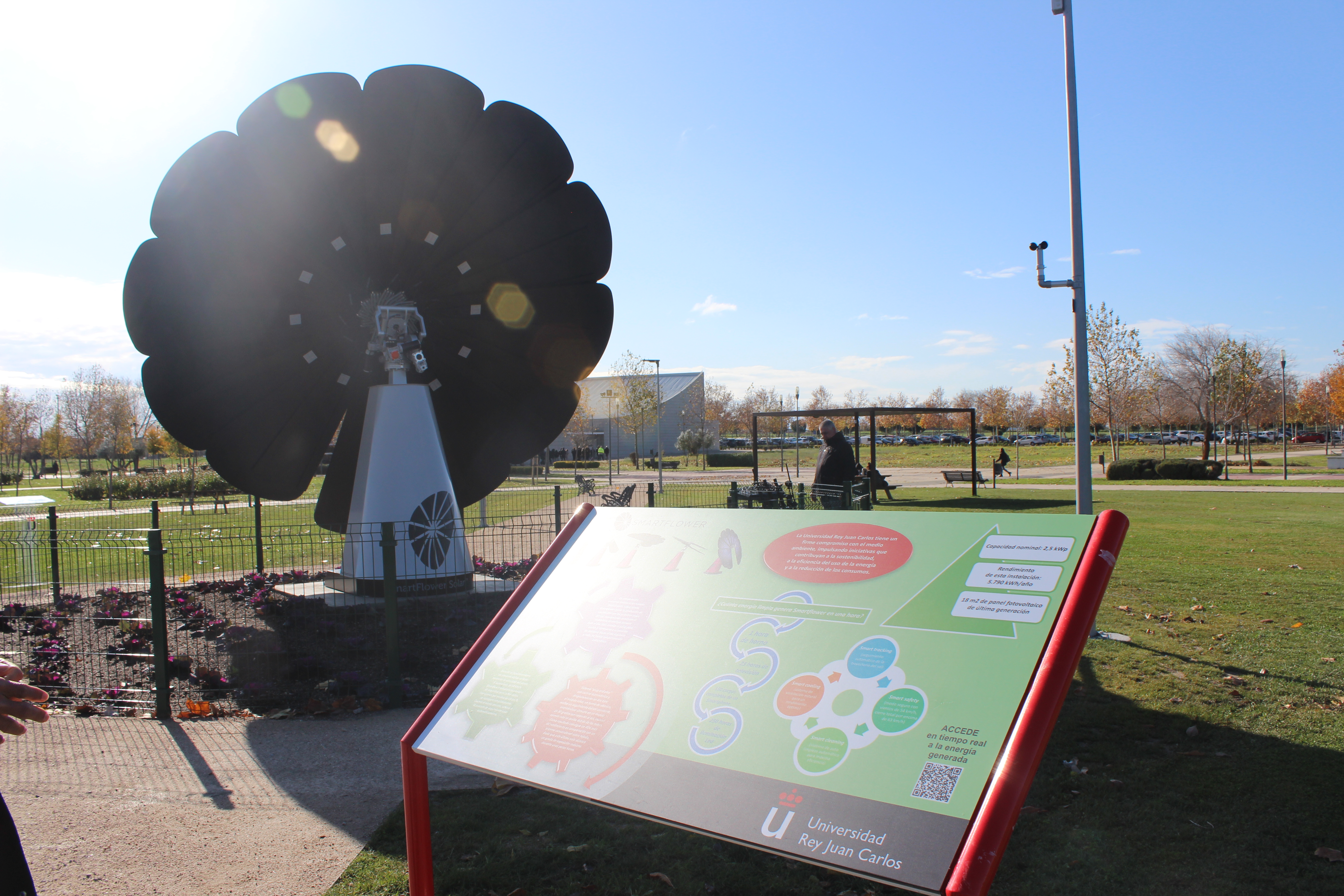 Informational display near SmartFlower unit at Universidad Rey Juan Carlos outdoor energy exhibit
