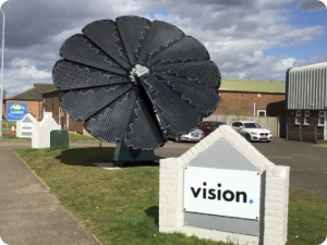 SmartFlower solar panel installed at entrance of Vision company in an industrial park
