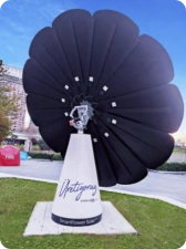 SmartFlower solar panel installed in an urban park or plaza in Uruguay