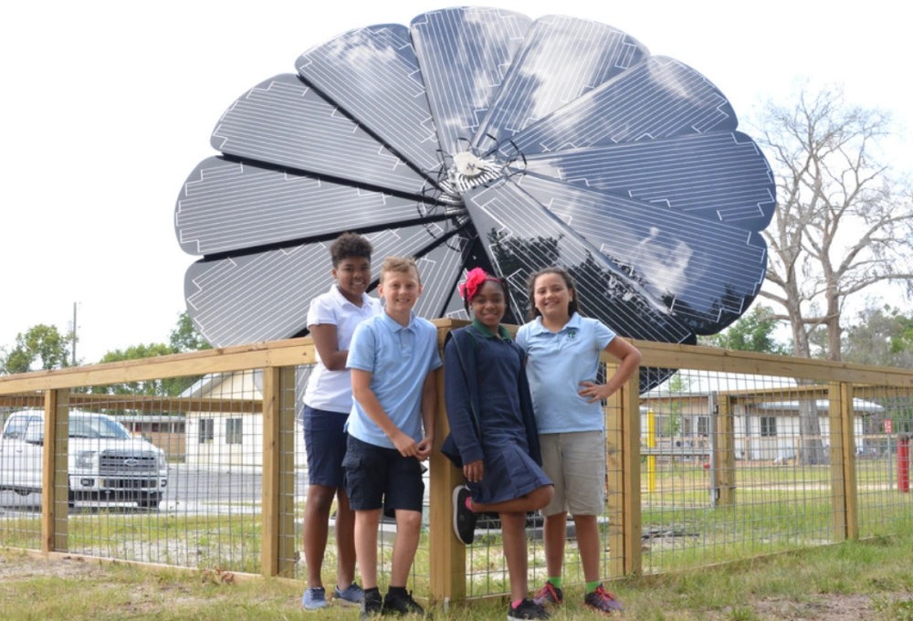Solar SmartFlower installed at a school campus as part of a sustainability or STEM program